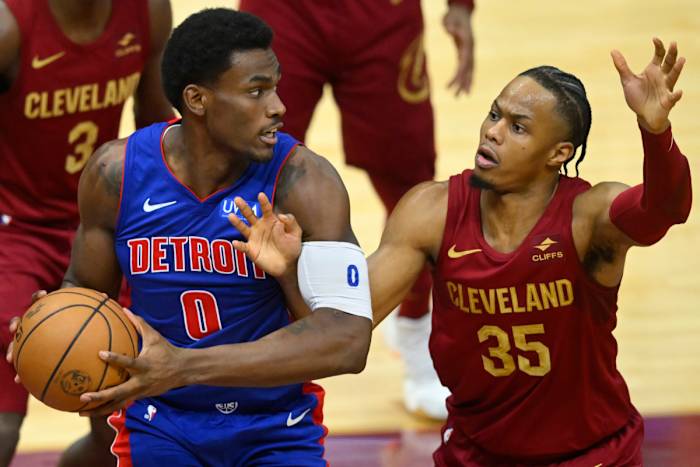 Jan 31, 2024; Cleveland, Ohio, USA; Cleveland Cavaliers forward Isaac Okoro (35) defends against Detroit Pistons center Jalen Duren (0) in the fourth quarter at Rocket Mortgage FieldHouse.